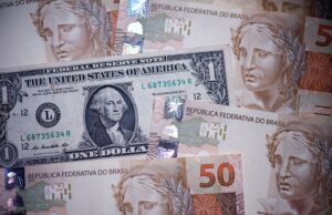 Dólar tem forte queda e chega a bater os R$ 5,91 com 'tarifaço' de Trump